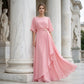 Flytende topp med kappeærmer og wrapbukser