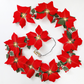 Julelys med julestjerneblomster