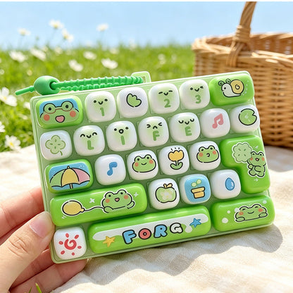 Søt nøkkelring med tastaturknapp – fidget-leketøy